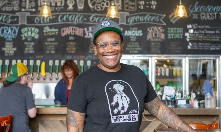 Famous brewing industry diversity advocate, Ren Navarro enjoying Cape Breton Island at Breton Brewing.