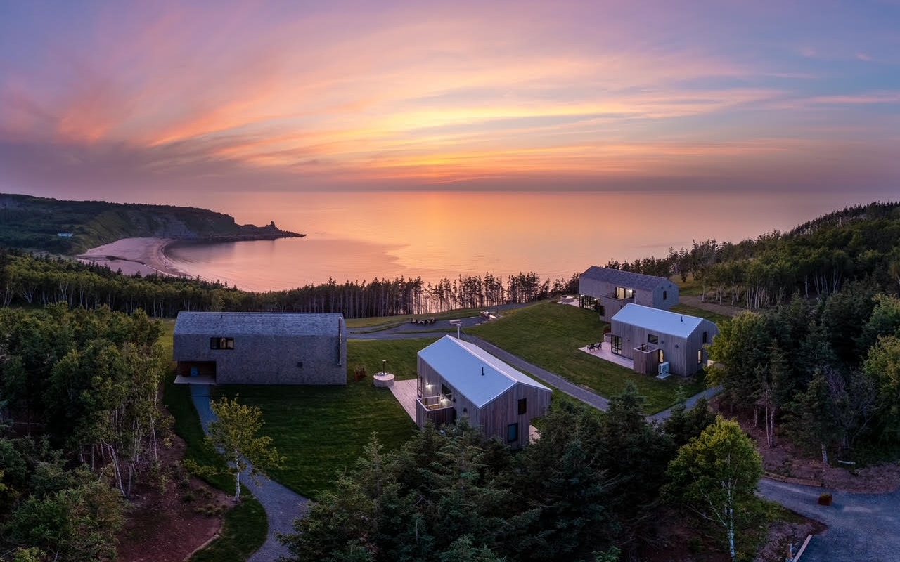 Ridge on the Chimney cabins in evening light with a beautiful snset
